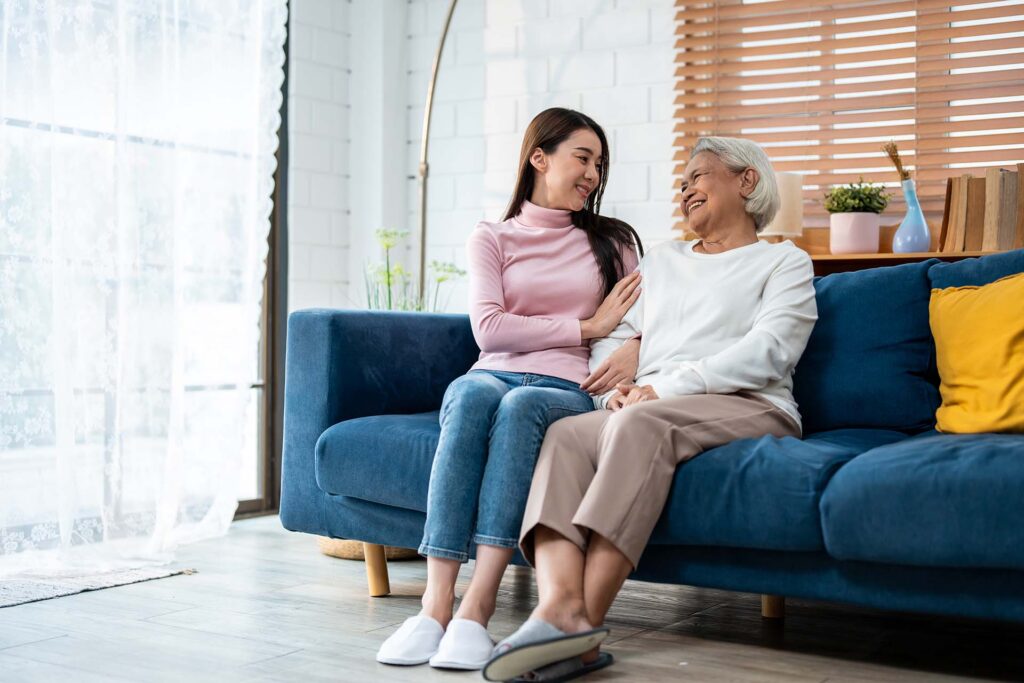 Elderly woman enjoying companionship and personal care as part of in-home care services in Illinois
